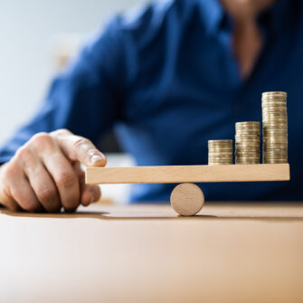 Man balancing coins