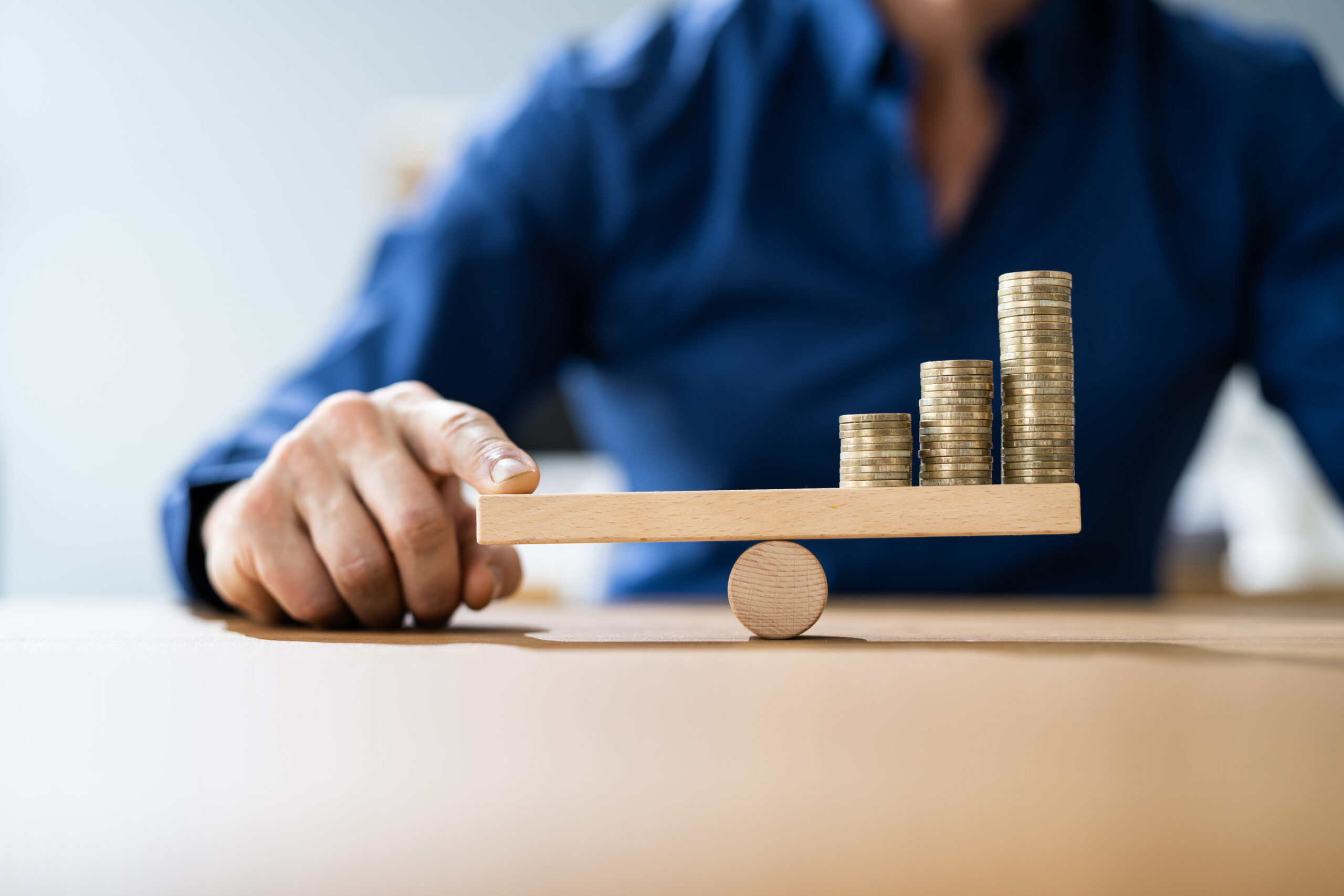 Man balancing coins